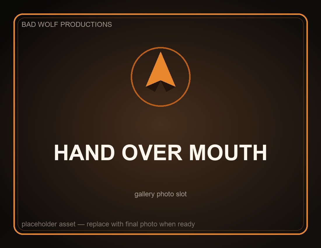 Kut — hand over mouth